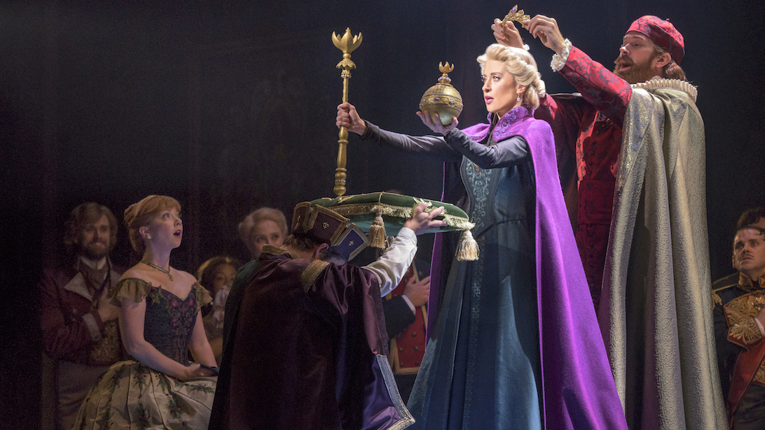 Elsa Being Crowned As The Queen While Anna Is Gazing In Amazement